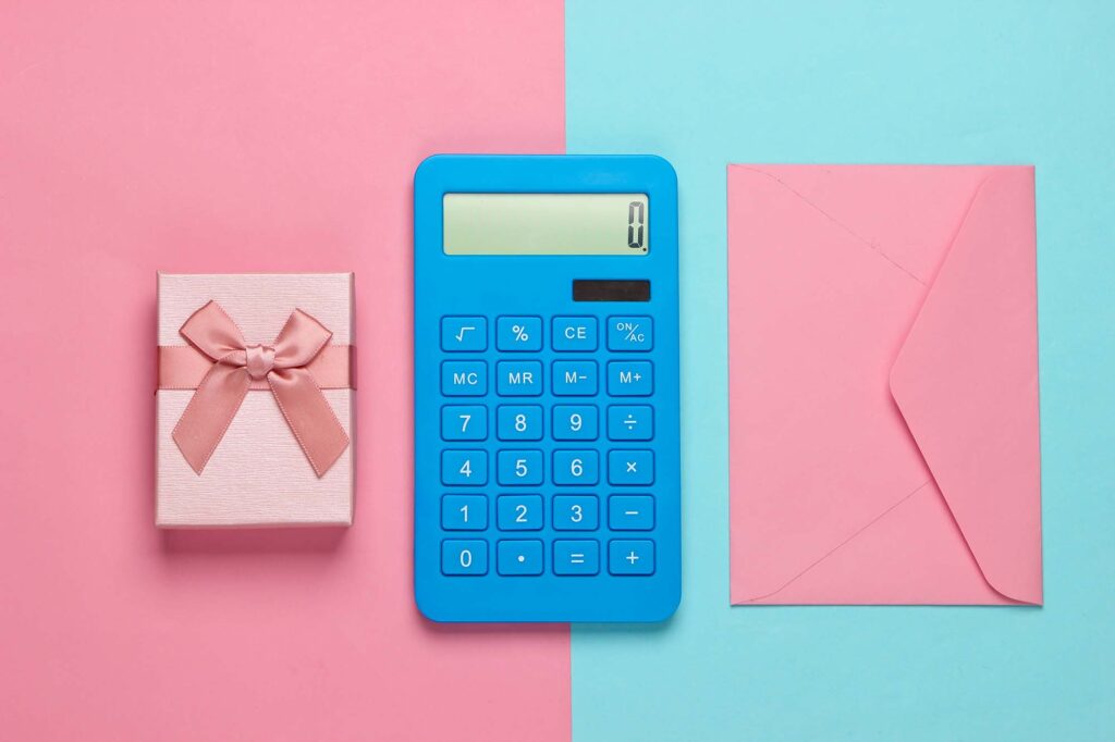 Baby Shower on a budget, pink and blue background with blue calculator
